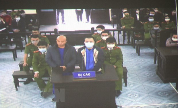Các bị cáo Nguyễn Xuân Đường và Bùi Mạnh Tiến tại phiên tòa (ảnh chụp qua màn hình).