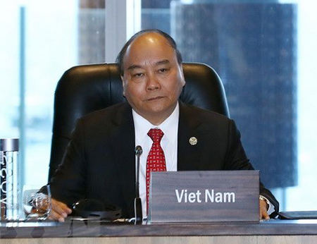 Thủ tướng Nguyễn Xuân Phúc dự Đối thoại giữa các Nhà lãnh đạo kinh tế APEC với Quỹ Tiền tệ Quốc tế.