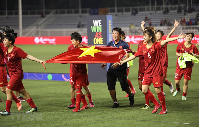 Các nữ tuyển thủ Việt Nam ăn mừng chiến thắng tại SEA Games 30.