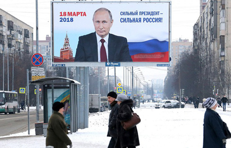 Hình ảnh tranh cử của Tổng thống Putin xuất hiện trên đường phố Nga.