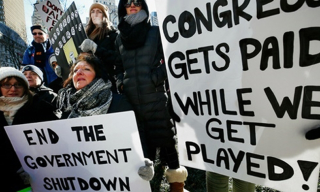 Người dân Mỹ biểu tình yêu cầu chấm dứt tình trạng đóng cửa chính phủ tại Boston ngày 11/1