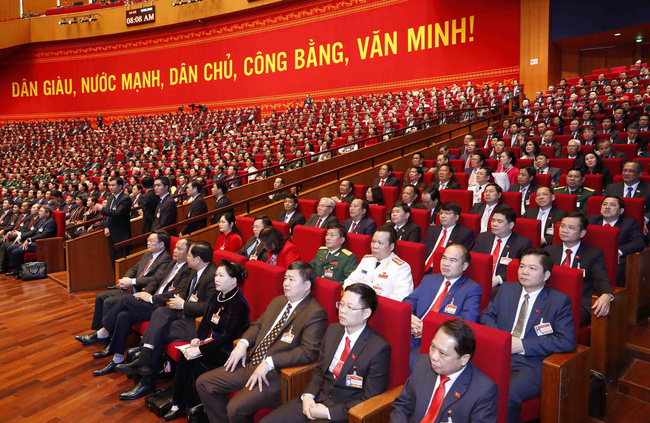 Các đại biểu dự phiên khai mạc Đại hội lần thứ XIII của Đảng.