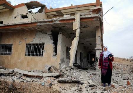 Căn nhà của người dân bị phá hủy do xung đột tại Đông Ghouta.