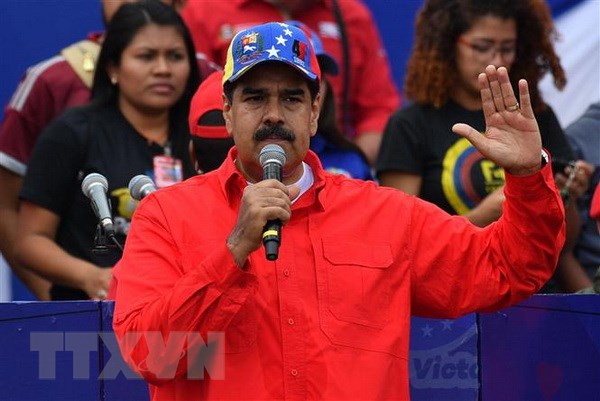 Tổng thống Venezuela Nicolas Maduro phát biểu trước những người ủng hộ nhân dịp kỷ niệm 20 năm cuộc cách mạng Bolivar do cố Tổng thống Hugo Chavez khởi xướng ở Caracas.