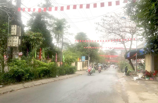 Hành lang, lòng lề đường trên tuyến đường Nguyễn Đức Cảnh đã trở nên thông thoáng sau những giải pháp quyết liệt của phường Yên Thịnh.