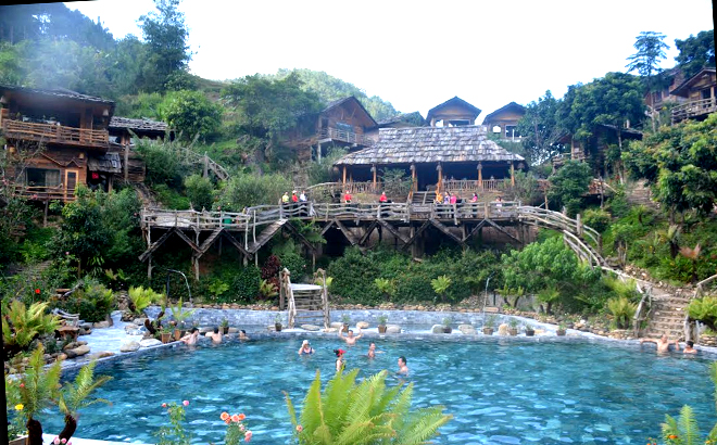 Visitors relax in hot spring pools.