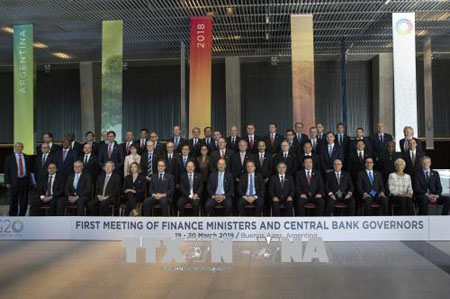 Bộ trưởng Tài chính và Thống đốc Ngân hàng trung ương các nền kinh tế thành viên G20 chụp ảnh chung tại hội nghị ngày 19/3.