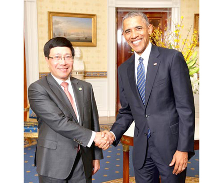 Tổng thống Mỹ Barack Obama đón Phó Thủ tướng, Bộ trưởng Bộ ngoại giao Phạm Bình Minh đến dự hội nghị Thượng đỉnh về An ninh hạt nhân lần 4