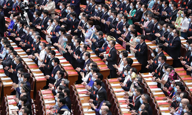 Các đại biểu dự phiên bế mạc kỳ họp quốc hội thường niên tại Đại lễ đường Nhân dân ở Bắc Kinh hôm nay.