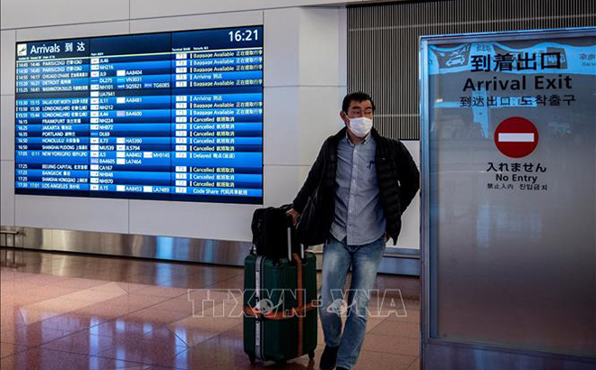 Hành khách tại sân bay Haneda ở Tokyo, Nhật Bản. (Ảnh tư liệu)