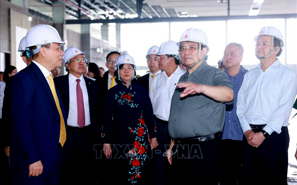 Thủ tướng Phạm Minh Chính kiểm tra tiến độ thi công dự án Trung tâm Hội chợ Triển lãm Quốc gia.