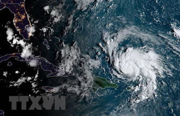 Hình ảnh ghi từ vệ tinh NOAA/RAMMB cho thấy bão Dorian quét qua vùng lãnh thổ Pueto Rico thuộc Mỹ trên vùng biển Caribe ngày 29/8/2019.