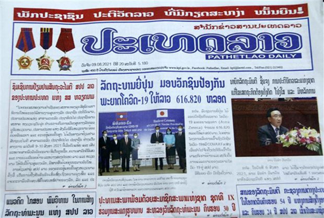 Báo PathetLao đăng trên trang nhất bài xã luận về chuyến thăm hữu nghị chính thức Lào của Chủ tịch nước Nguyễn Xuân Phúc.