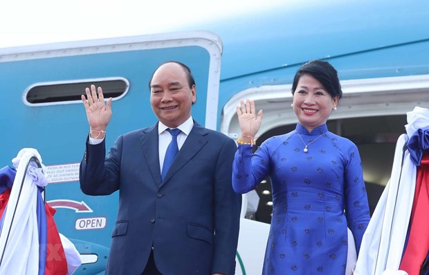 President Nguyen Xuan Phuc and his spouse at Wattay international airport