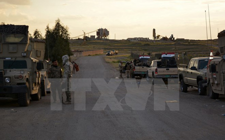 Binh sỹ quân đội Iraq sau khi giành lại một khu vực từ tay IS.