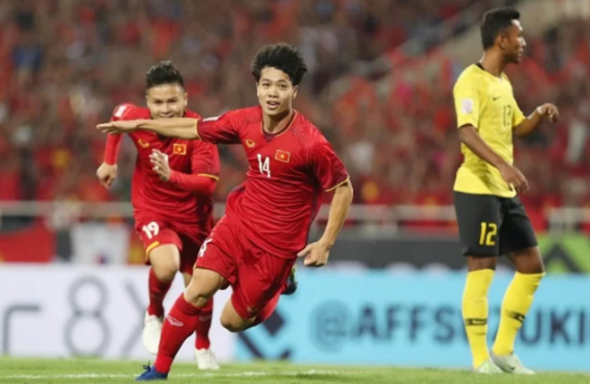 Công Phượng mừng bàn thắng vào lưới Malaysia ở vòng bảng AFF Cup 2018.