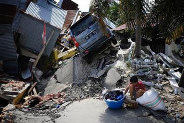 Nhiều khu vực ở thành phố Palu, Indonesia tan hoang sau thảm họa.