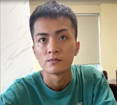 Vũ Văn Đức tại cơ quan công an.