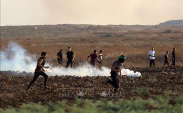 Người biểu tình Palestine xung đột với binh sĩ Israel tại khu vực biên giới Dải Gaza-Israel, ngày 1/9/2023.