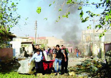 Hiện trường một vụ đánh bom ở Kirkuk, phía bắc Baghdad, Iraq ngày 27-11.
