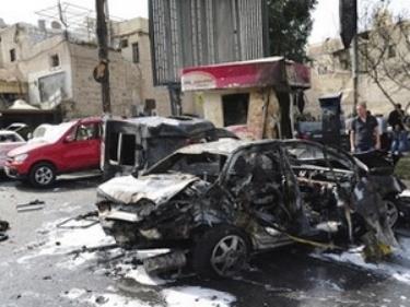Hiện trường một vụ đánh bom ở Syria.