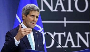 Ngoại trưởng John Kerry tại cuộc họp báo bên lề Hội nghị Ngoại trưởng NATO.