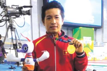 Vận động viên Nguyễn Thành Trung, người phá kỷ lục châu Á nội dung bơi 100 m ếch nam tại ASEAN Para Games 8.