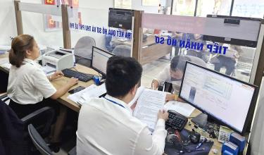 Lộ trình tinh giản biên chế được gắn với cơ cấu lại, nâng cao chất lượng đội ngũ cán bộ, công chức, viên chức theo vị trí việc làm. Ảnh minh họa: VGP