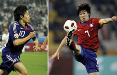 Shinji Kagawa (Nhật Bản - trái) và Park Ji-sung (Hàn Quốc).