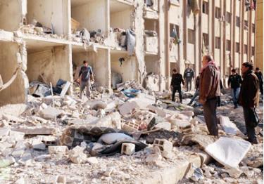 Trường đại học Aleppo sau khi bị tấn công.