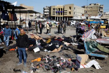 Hiện trường vụ đánh bom liều chết kép tại một khu chợ ở thủ đô Baghdad, Iraq ngày 21-1