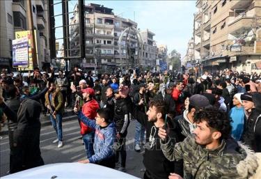 Người dân tại thủ đô Damascus, Syria ngày 8-12-2024.