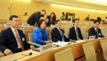 Deputy PM Tran Luu Quang (centre) and other Vietnamese officials before the opening of the UNHRC's 52nd regular session on February 27