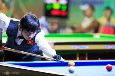 Cơ thủ Đặng Đình Tiến tại SEA Games 2013 ở Myanmar, nơi anh đoạt HC vàng carom 1 băng đơn nam.