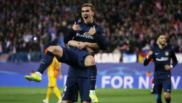 Niềm vui của Griezmann sau khi mở tỉ số cho Atletico.