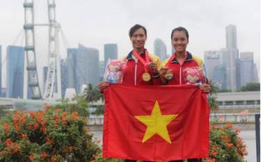 Bộ đôi Phạm Thị Thảo (trái) - Tạ Thanh Huyền thi đấu xuất sắc tại Vòng loại Olympic 2016.