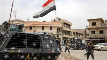 Lực lượng cảnh sát liên bang tuần tra đường phố ở phía Tây Mosul, Iraq ngày 8/4/2017.