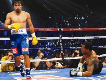 Cú đấm trời giáng của Manny Pacquiao khiến Mosley đo đài