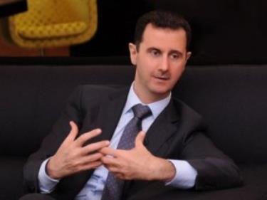 Tổng thống Syria, ông Bashar al-Assad xuất hiện trên truyền hình hồi năm 2012.