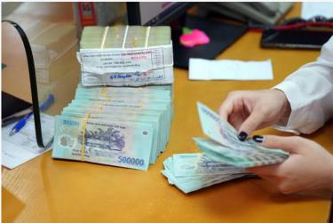 Các ngân hàng thương mại phải công khai minh bạch lãi suất cho vay và huy động. Ảnh minh hoạ