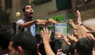 Người biểu tình ủng hộ cựu Tổng thống Morsi trong cuộc tuần hành ở trung tâm Cairo, ngày 19/6.