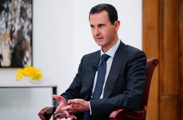 Tổng thống Syria Bashar al- Assad trả lời phỏng vấn báo chí ở Damascus.