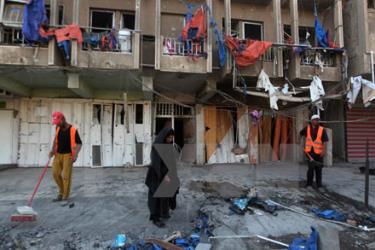 Hiện trường một vụ đánh bom liều chết tại quận Bayaa, phía Tây Baghdad.