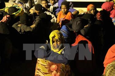 Người di cư tại trại tiếp nhận ở Tripoli, Libya ngày 29/6.