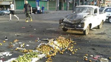 Hiện trường một vụ đánh bom liều chết tại Sweida, Syria.