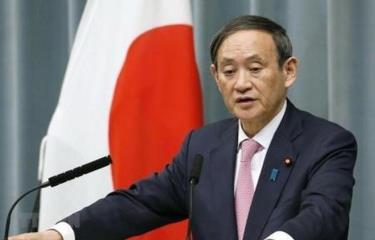 Chánh Văn phòng Nội các Nhật Bản Yoshihide Suga tại cuộc họp báo ở Tokyo.