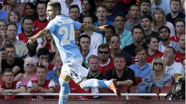 Insigne ăn mừng bàn thắng mở tỷ số cho Napoli (Ảnh: AP).