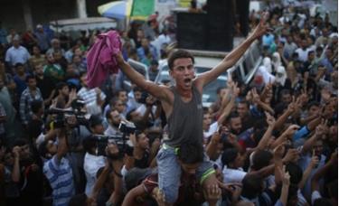 Người Palestine ăn mừng thỏa thuận ngừng bắn.