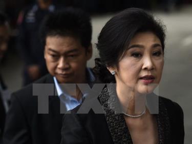 Cựu Thủ tướng Thái Lan Yingluck Shinawatra (phải) tại Tòa án tối cao ở thủ đô Bangkok ngày 1/8.