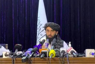 Người phát ngôn của Taliban, ông Zabihullah Mujahid, phát biểu tại cuộc họp báo đầu tiên ở Kabul, Afghanistan, vào ngày 17-8.